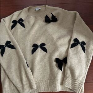 Women's Beige Sweater with Black Bow Accents